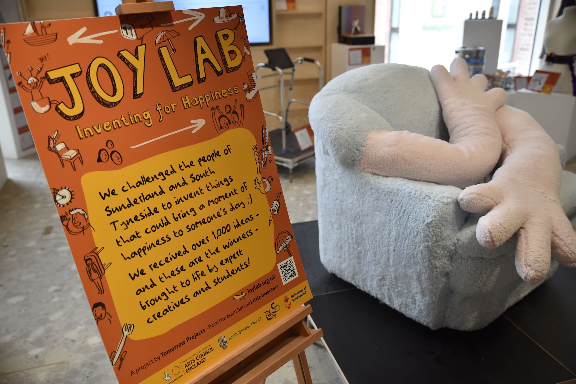 Joy Lab poster and Hug Chair